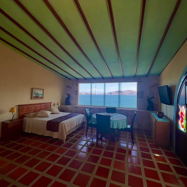 Posada Iguanazul Suites background