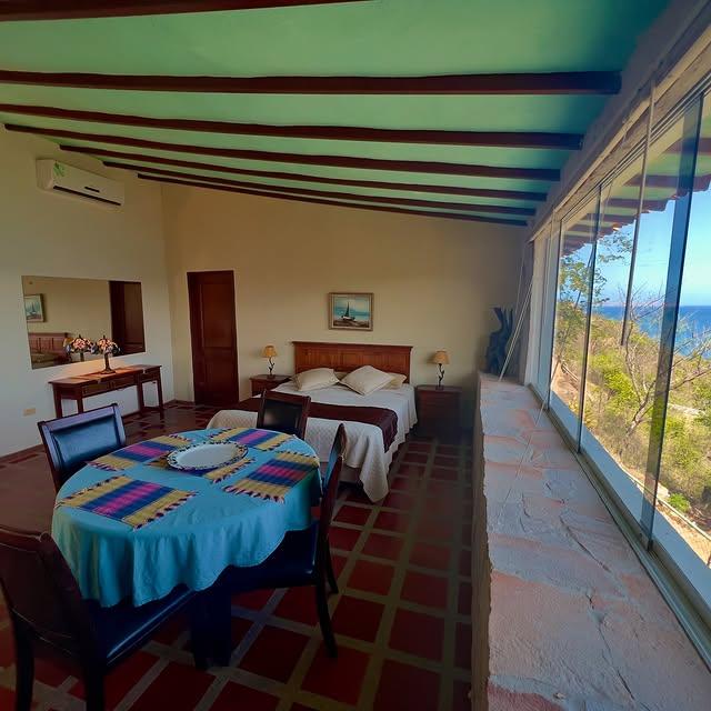 Posada Iguanazul Suites background