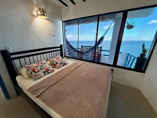 Ocaso Casa de Playa background