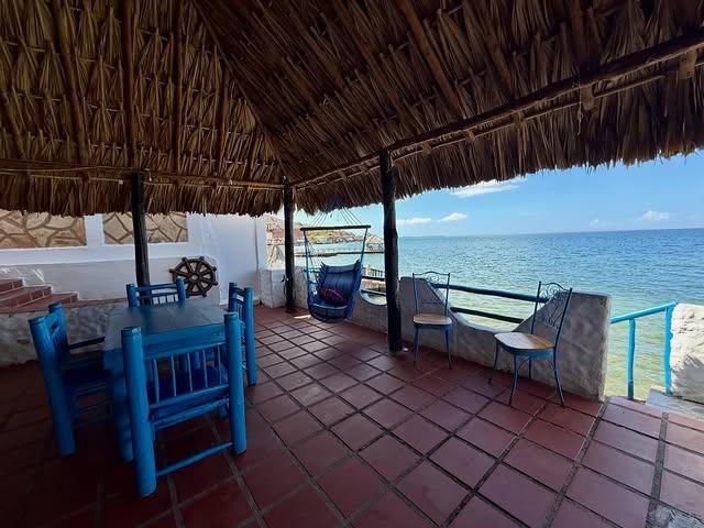 Ocaso Casa de Playa background