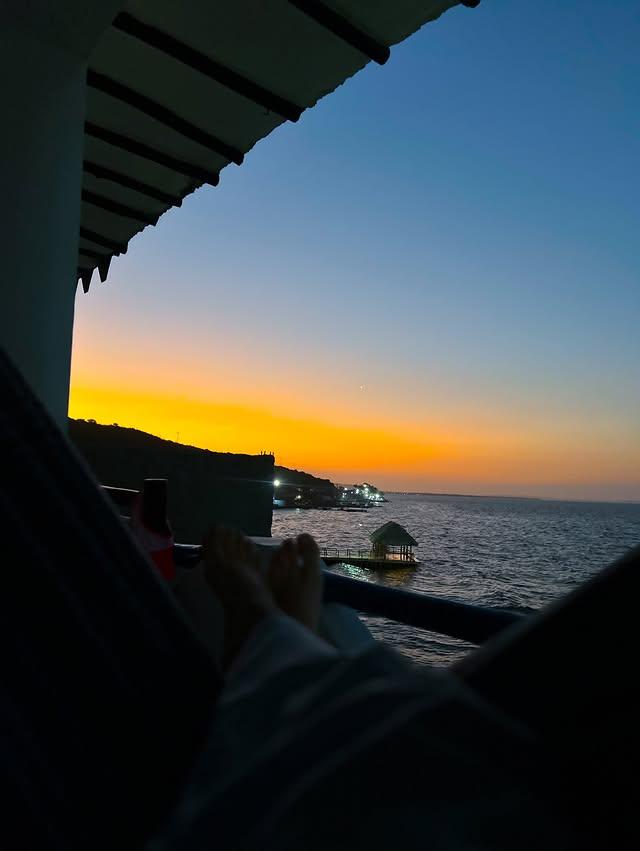 Ocaso Casa de Playa background