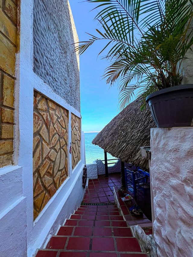 Ocaso Casa de Playa background