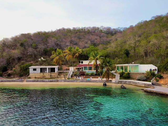 Arapo Villa de Playa background