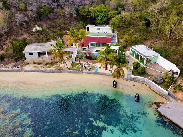 Arapo Villa de Playa background