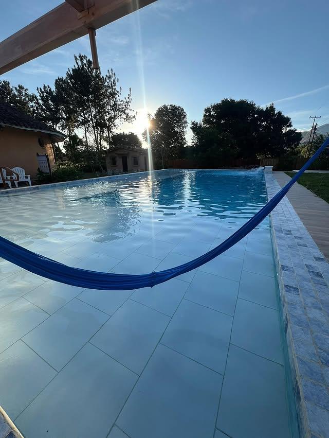 Amarama Posada background