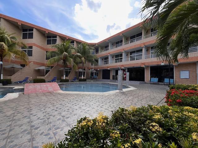 Ensenada Suites background