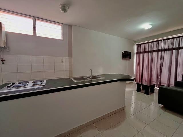 Ensenada Suites background