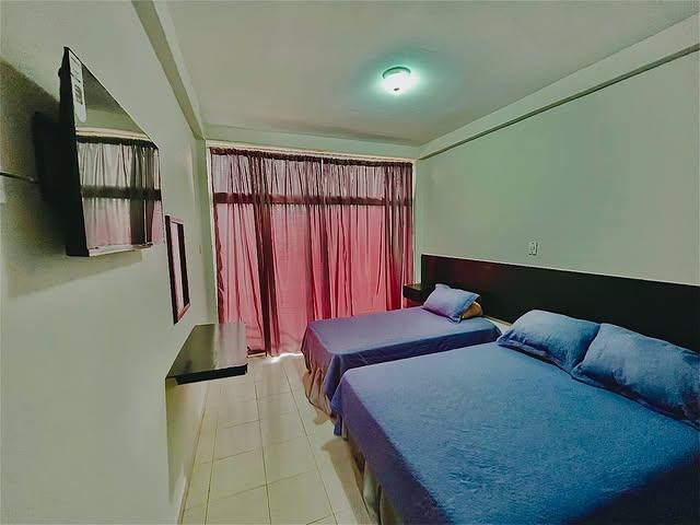 Ensenada Suites background