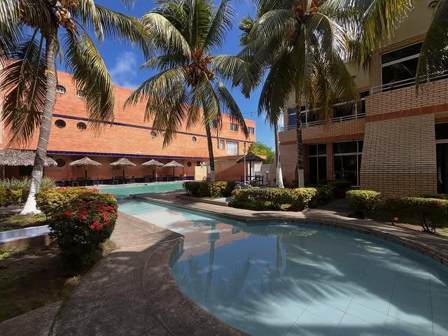 Ensenada Suites background