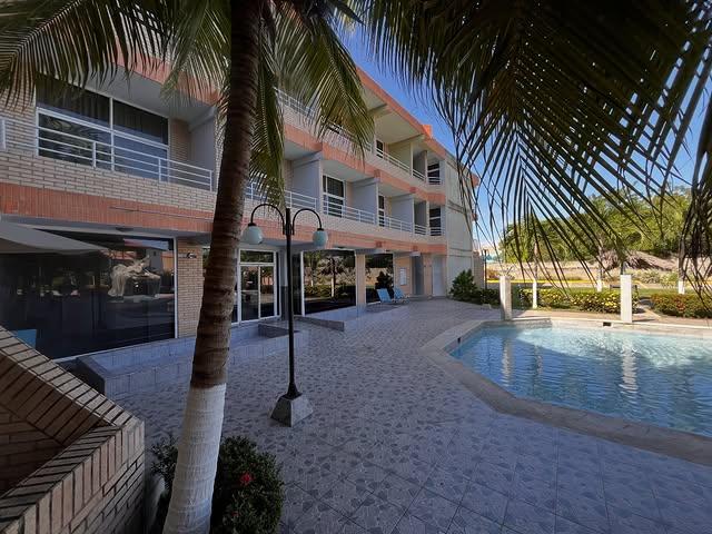 Ensenada Suites background