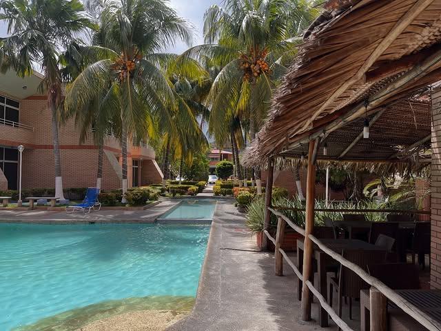 Ensenada Suites background