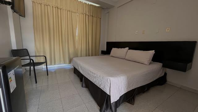 Ensenada Suites background