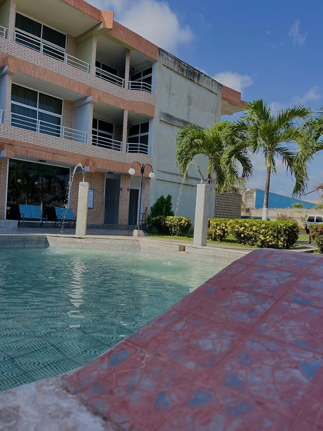 Ensenada Suites background