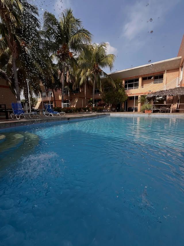 Ensenada Suites background