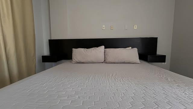 Ensenada Suites background