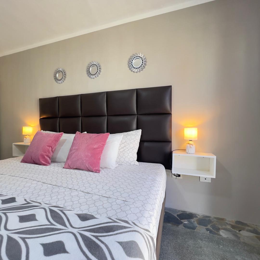 Hospedate Ya Margarita background