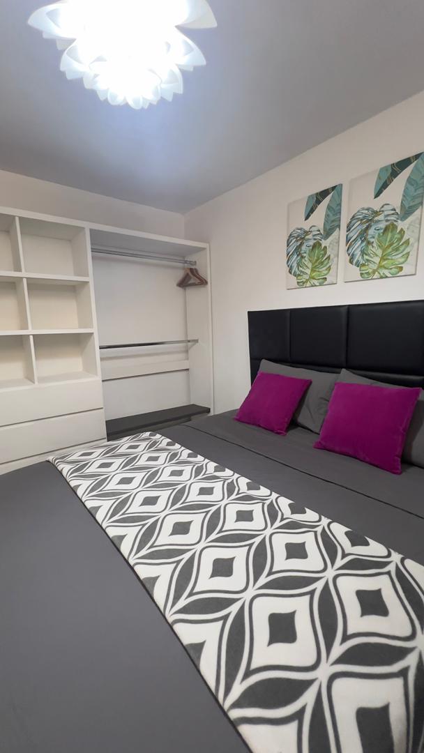 Hospedate Ya Margarita background